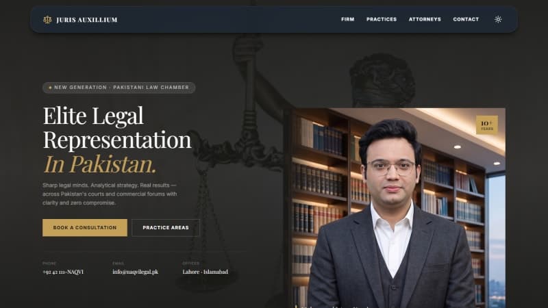 Juris Auxillium law-chamber homepage in dark mode — navy-and-gold theme with the Elite Legal Representation In Pakistan headline, one half of the site's complete light/dark theme pair