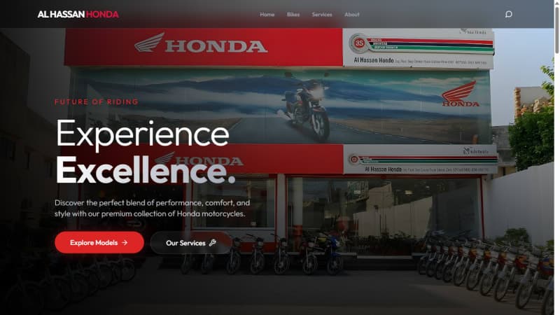 Al Hassan Honda homepage hero — premium dark landing page with an 'Experience Excellence' headline for the Honda motorcycle dealership